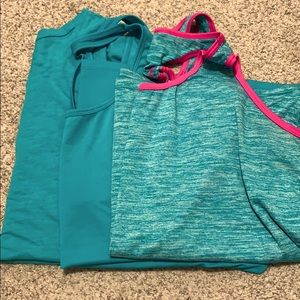 Three aqua colored athletic tanks, XL/XXL.